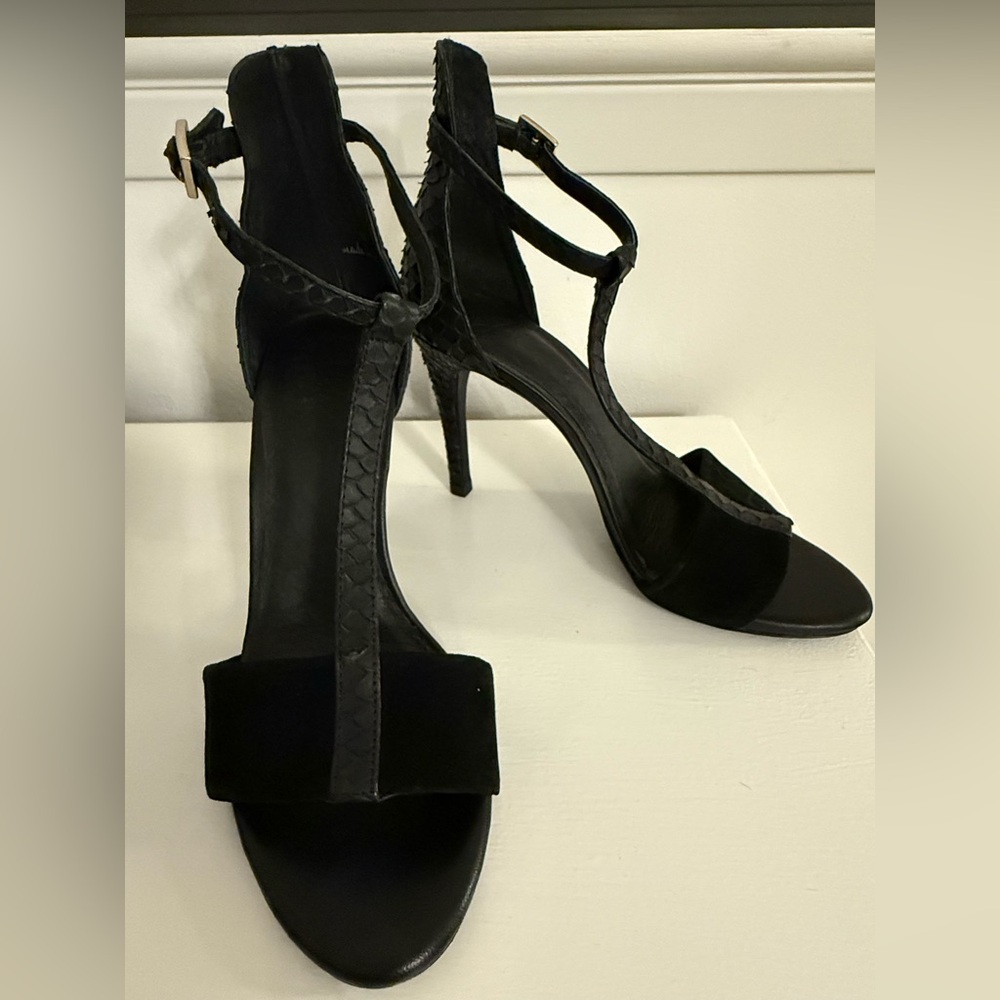 Black suede and snakeskin 4” pumps w ankle strap.